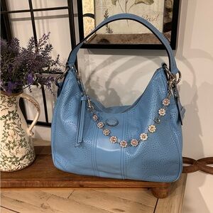 Coach Blue Hobo Bag with Floral Charm